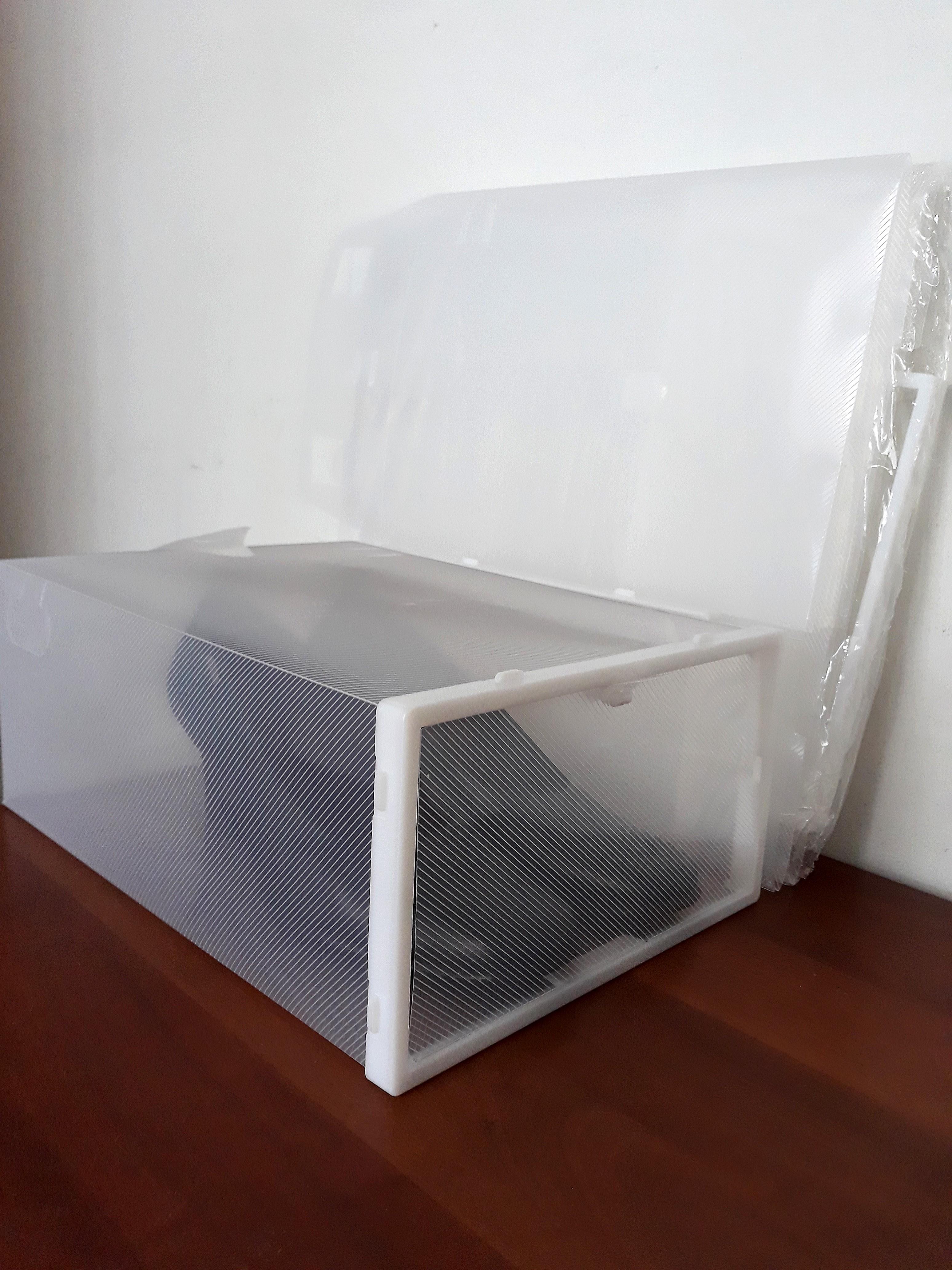Self Assemble Foldable / Stackable Translucent Plastic Storage Box (Category: Everything Else) located in Singapore. Submitted by wondergal (Listing ID 187467705, Image 2). Description: 3 boxes brand new. Multipurpose storage idea:- - Shoes box - Organise your storage in wardrobe - belts / socks - A4 documents - Unused plates - Plastic bags - Toys 30cm X 21cm X 12cm.