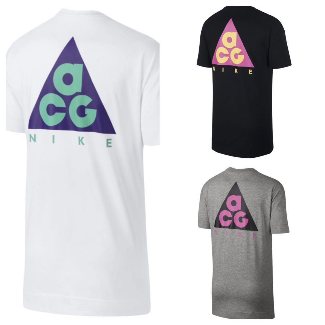 white and purple nike shirt