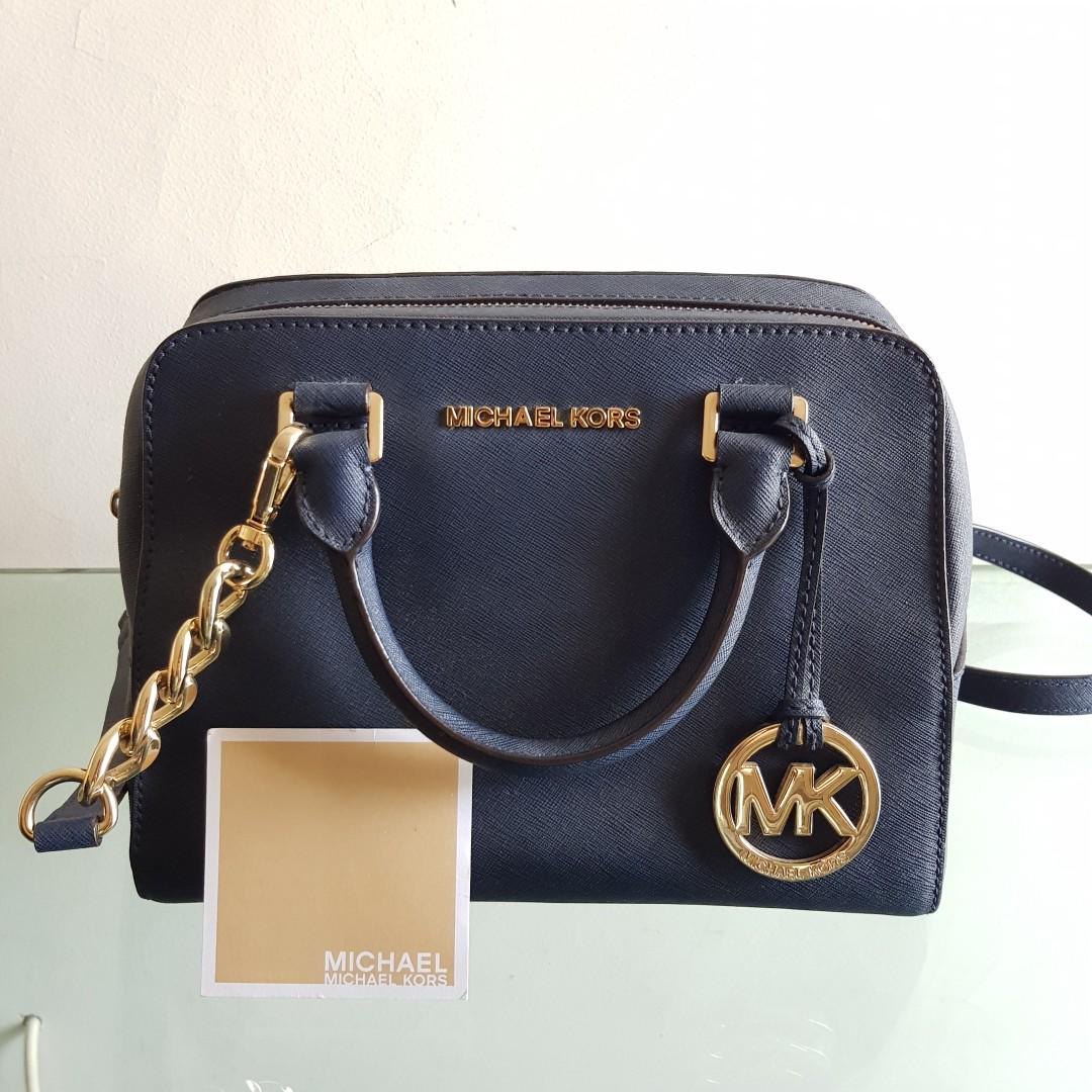 harga sling bag michael kors