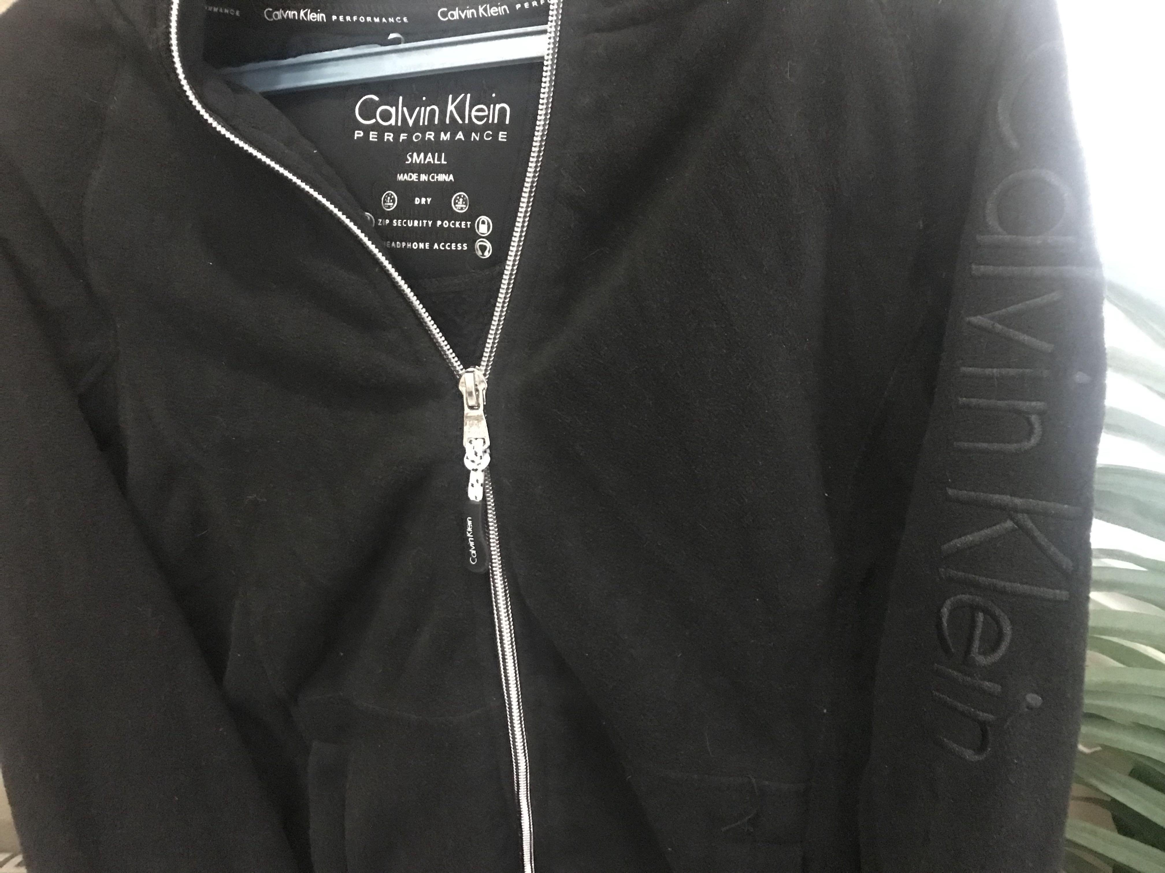 Calvin klein performance cheap jacket headphone access