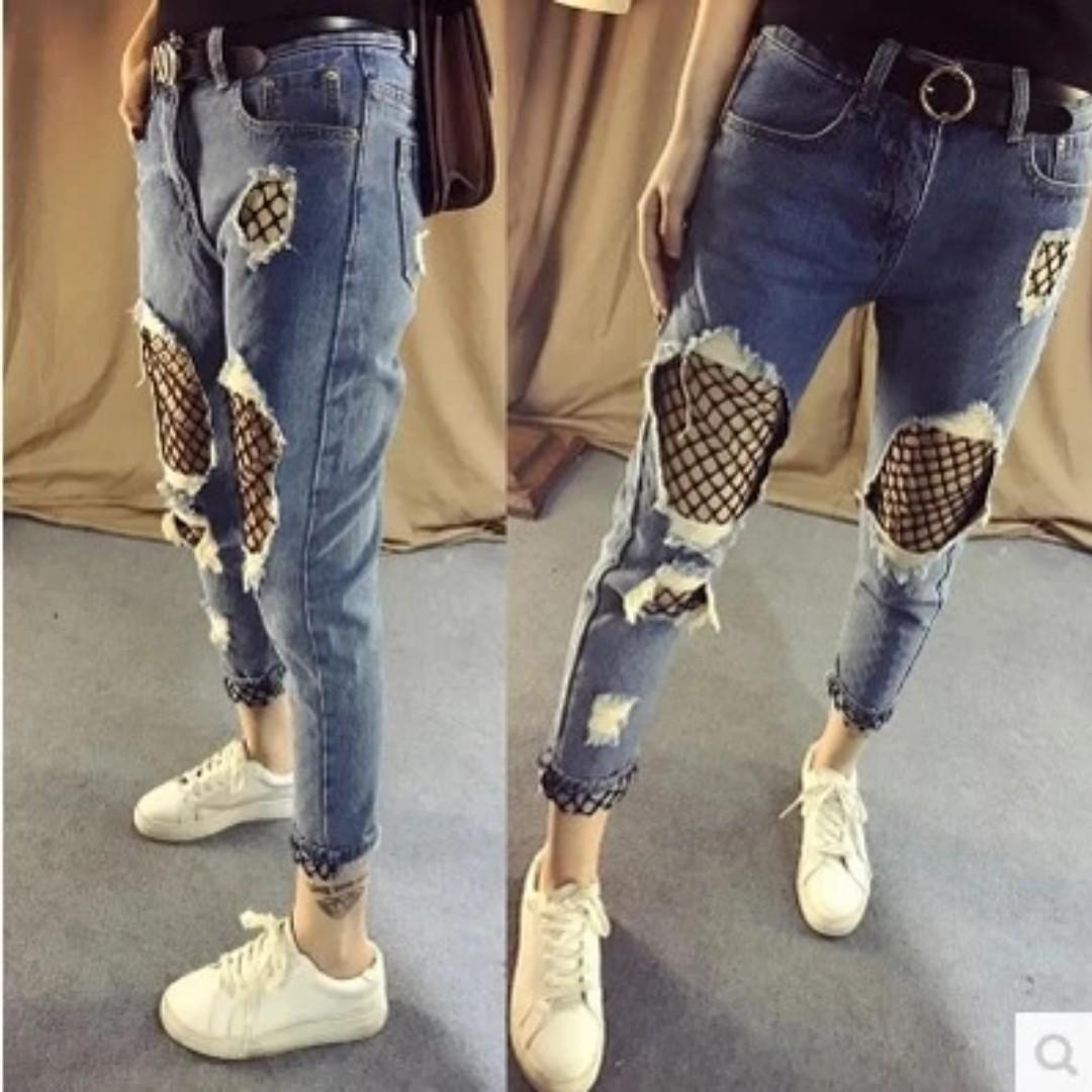 ripped jeans with net stockings