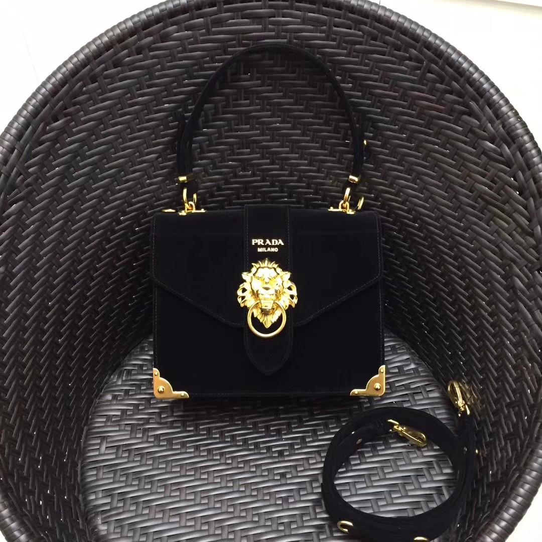 Prada Cahier Animalier lion head bag, Luxury, Bags & Wallets on Carousell