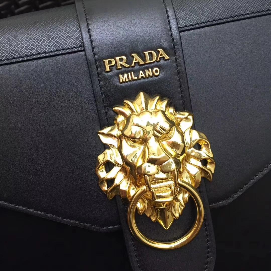 Prada cahier animalier lion head bag, Luxury, Bags & Wallets on Carousell