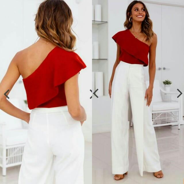 red top white pants outfit