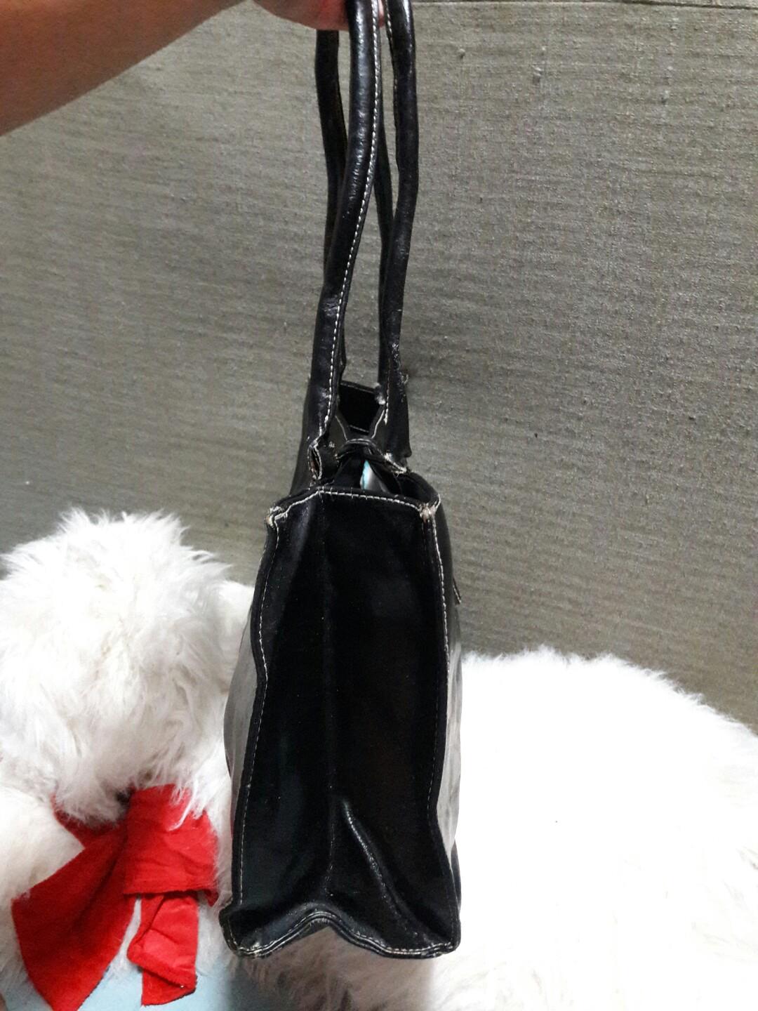 Wilsons leather maxima purse deals
