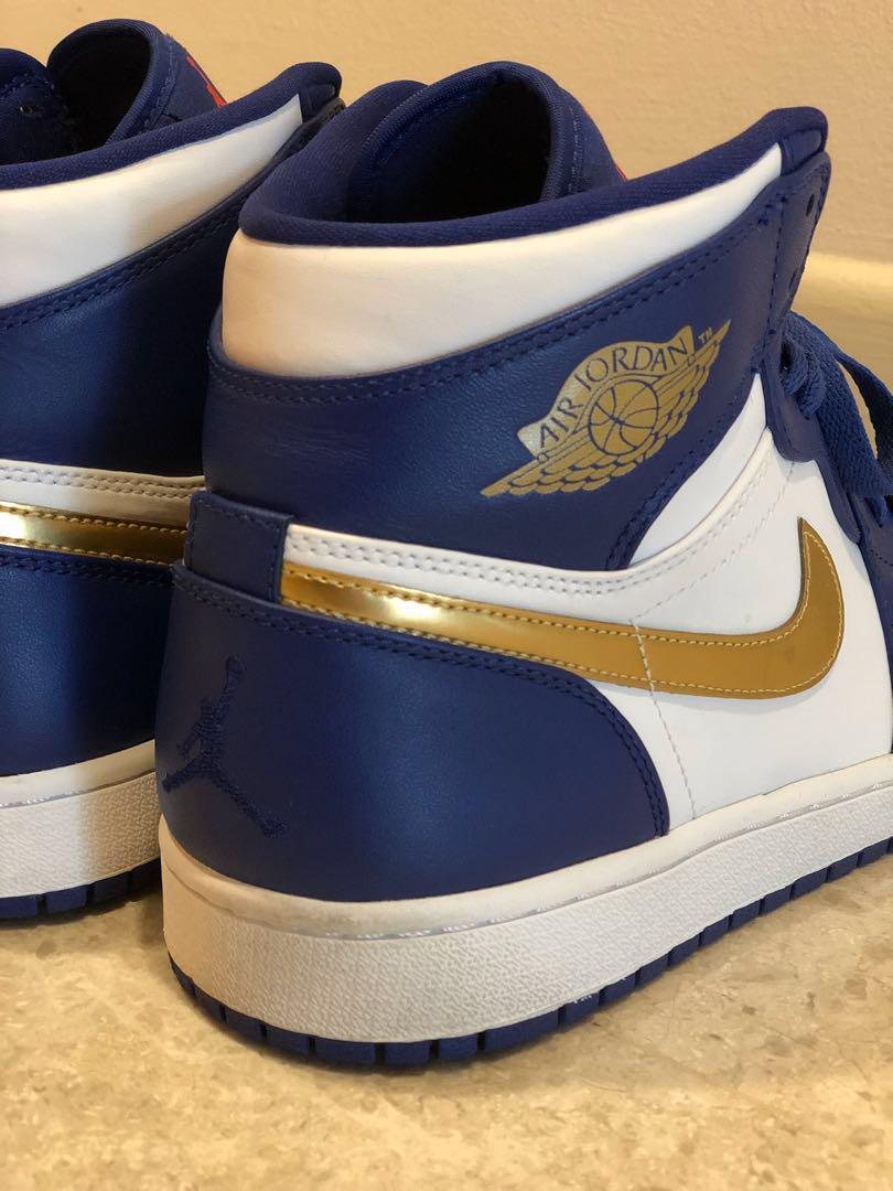 Royal blue and gold jordans outlet