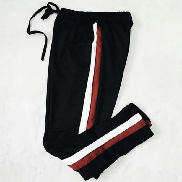 red and white striped track pants