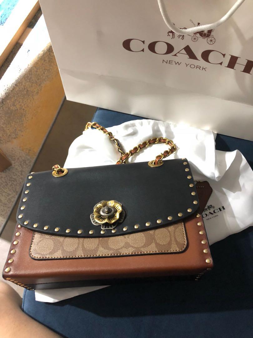 Coach parker deals sling bag