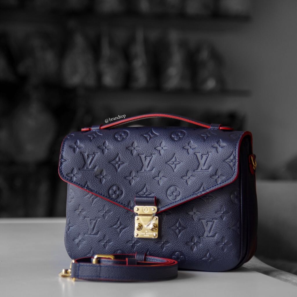 Authentic Louis Vuitton Marine Rouge Empreinte Leather Pochette