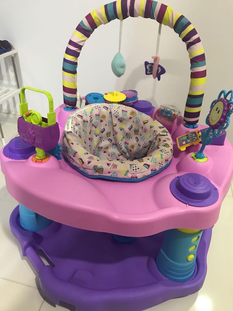 pink and purple exersaucer