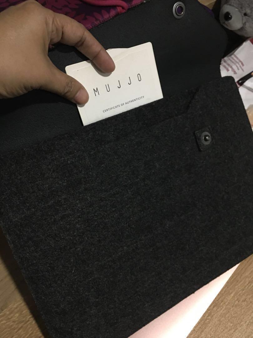 #REPRICED🍁Macbook 12-inch case (Category: Laptops & Notebooks) located in Quezon City. Submitted by legisgirl24 (Listing ID 169721888, Image 3). Description: Mujjo a well-known brand. Gives full protection to your gadget. This is almost new. Original price in Mac Store is much higher. Bought this in US. Selling it a lower and reasonable price. Very nice! 👍 * with card of authenticity. .