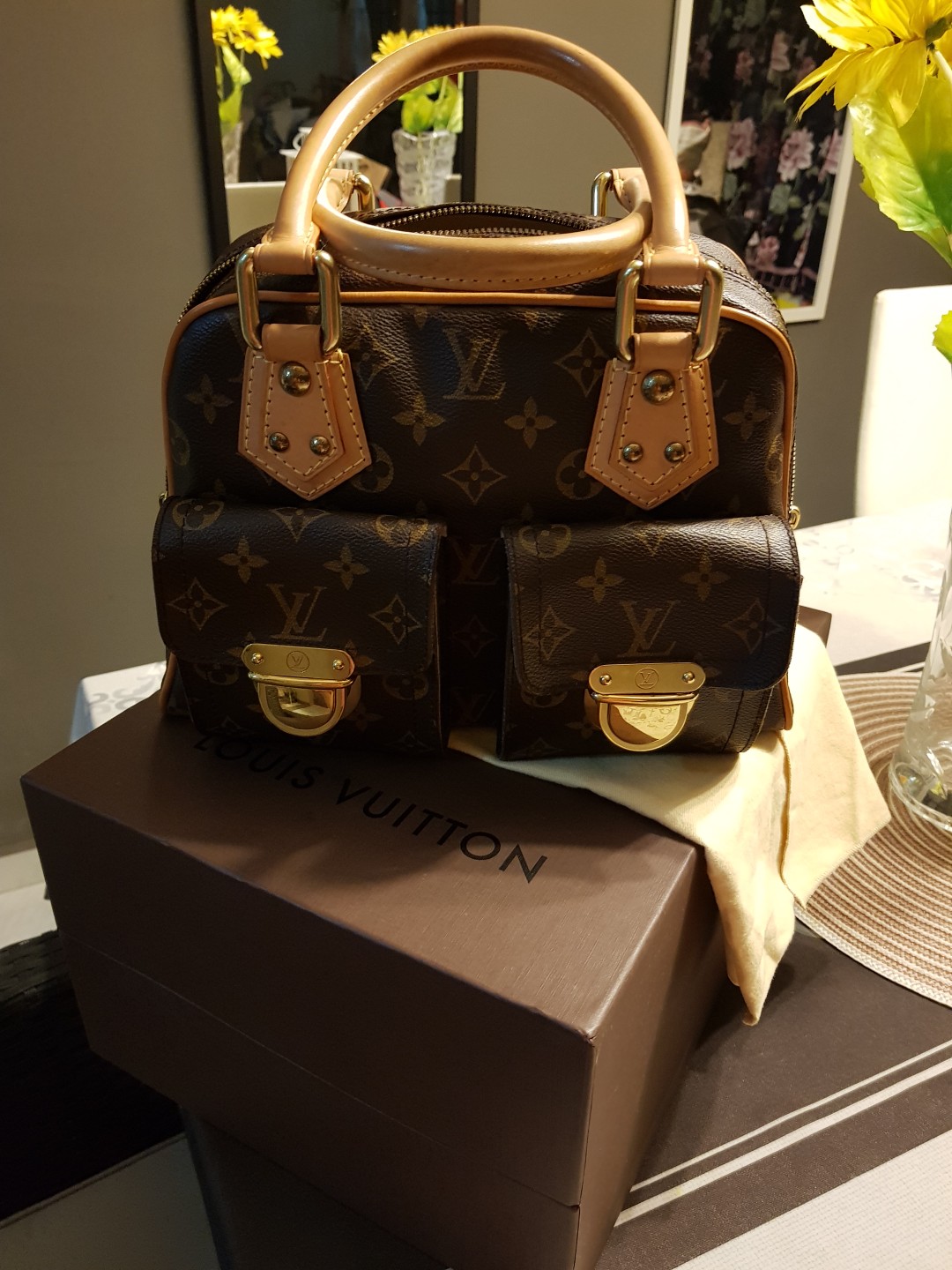 Louis Vuitton Manhattan PM, Women's Fashion, Bags & Wallets, Cross-body  Bags on Carousell