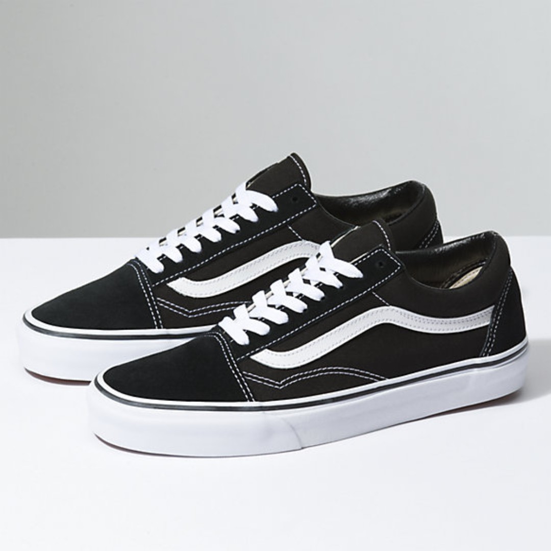 white and black authentic vans