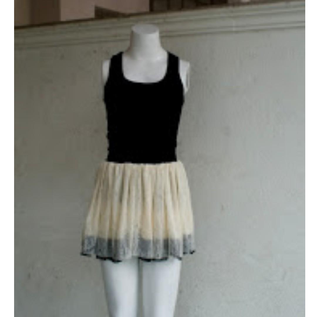 cream skirt black top