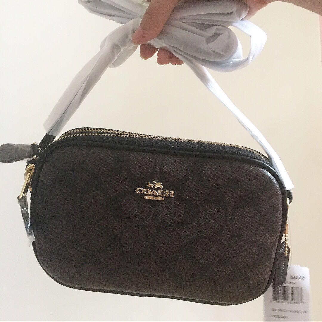 Coach double deals zip sling bag