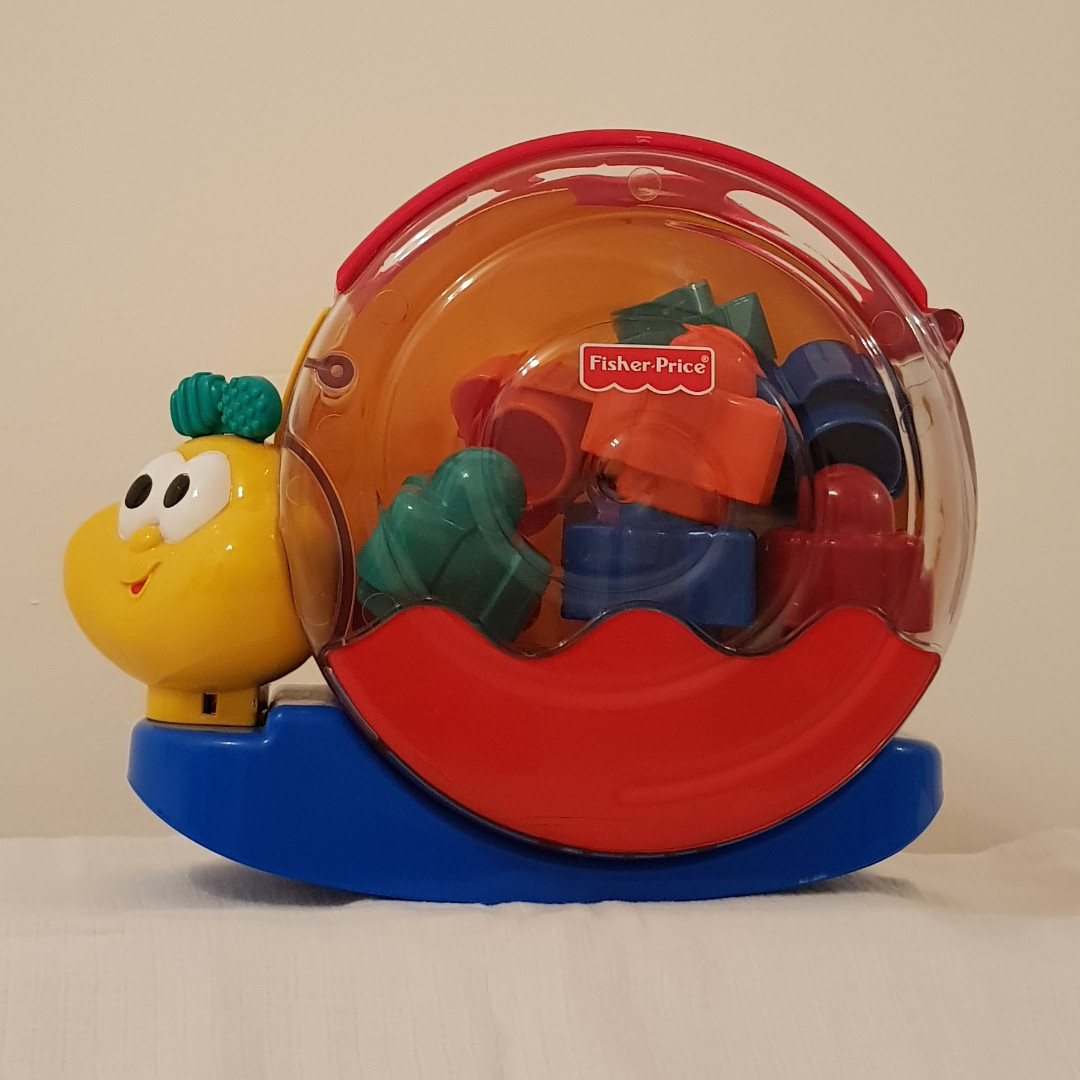 Fisher price snail shape sorter top