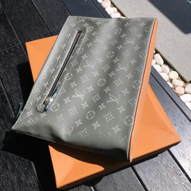 Louis Vuitton Titanium Clutch, Luxury, Bags & Wallets on Carousell