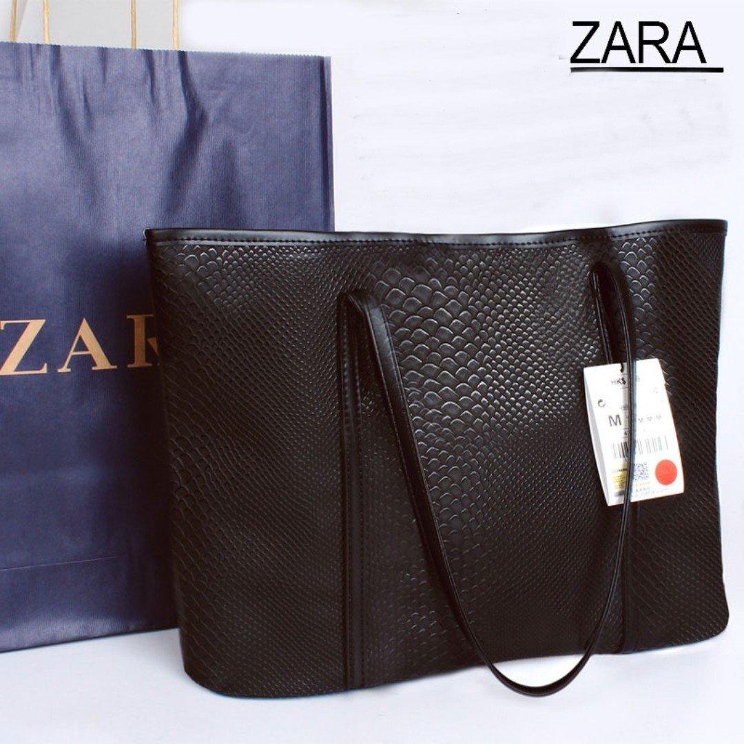 black snakeskin tote bag