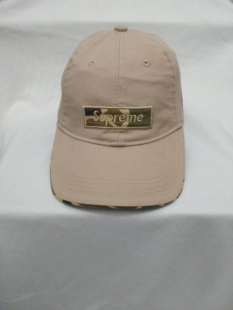 Topi supreme hotsell x bape original