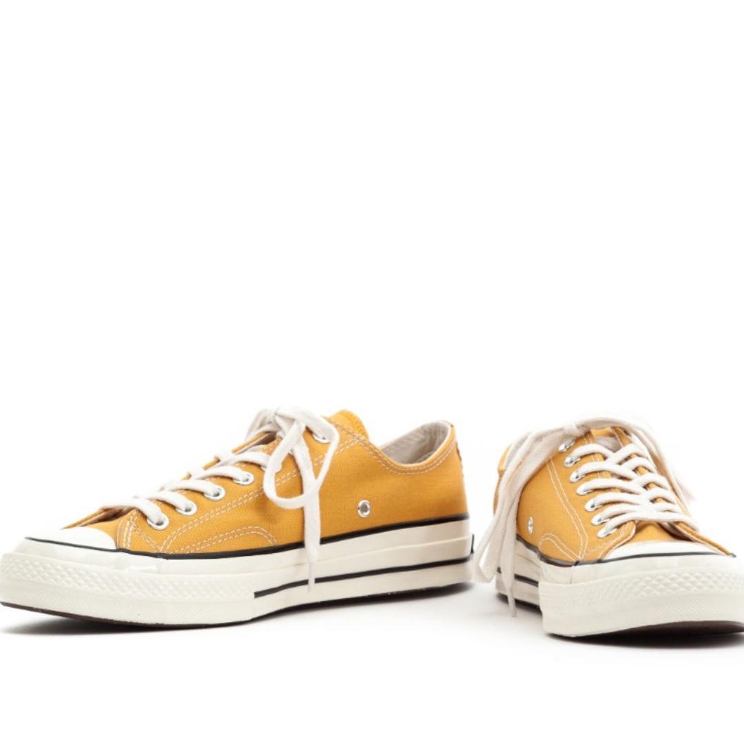 yellow converse shoes