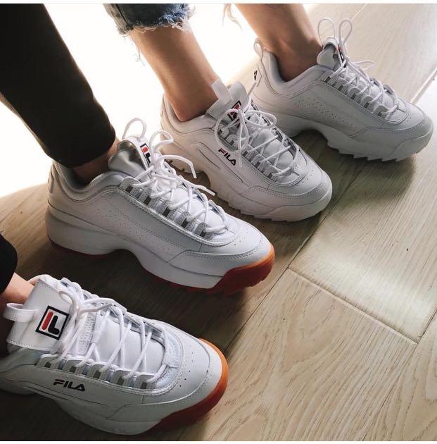 white fila with gum bottoms