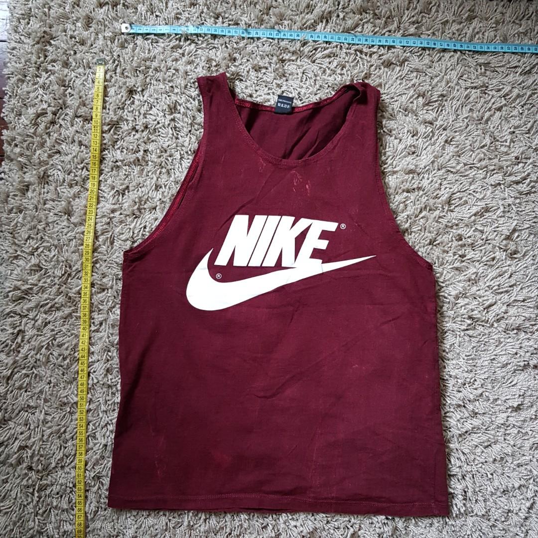 Assorted Singlets (Category: Tshirts & Polo Shirts) located in Singapore. Submitted by grabquick (Listing ID 190102874, Image 2). Description: Selling some singlets purchased from my trips to Thailand! Buy 1 for $8. Growing your wardrobe? Buy 2 at $15. Buy 3 at $22. Buy 4 at $28! All worn only once. Feels like a Male S. Adidas is slightly wider. -----SOLD OUT----- Nike (Red) Chest: 46cm Length: 65cm Condition: 8/10 Rinjani (Black) Chest: 46cm Len
