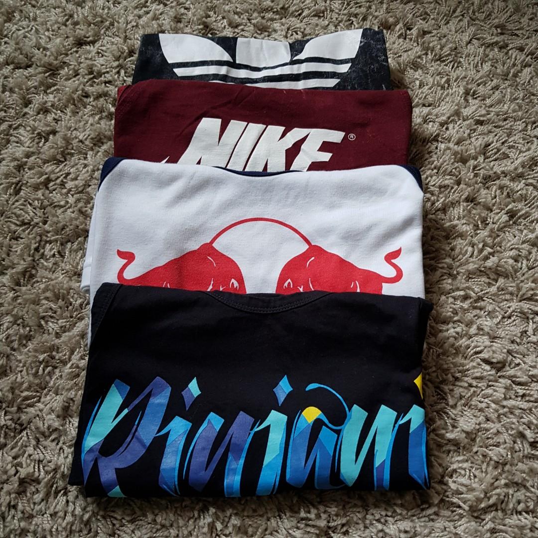 Assorted Singlets (Category: Tshirts & Polo Shirts) located in Singapore. Submitted by grabquick (Listing ID 190102874, Image 1). Description: Selling some singlets purchased from my trips to Thailand! Buy 1 for $8. Growing your wardrobe? Buy 2 at $15. Buy 3 at $22. Buy 4 at $28! All worn only once. Feels like a Male S. Adidas is slightly wider. -----SOLD OUT----- Nike (Red) Chest: 46cm Length: 65cm Condition: 8/10 Rinjani (Black) Chest: 46cm Len