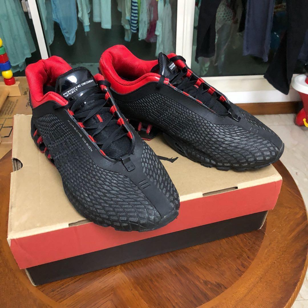 black yeezys red writing