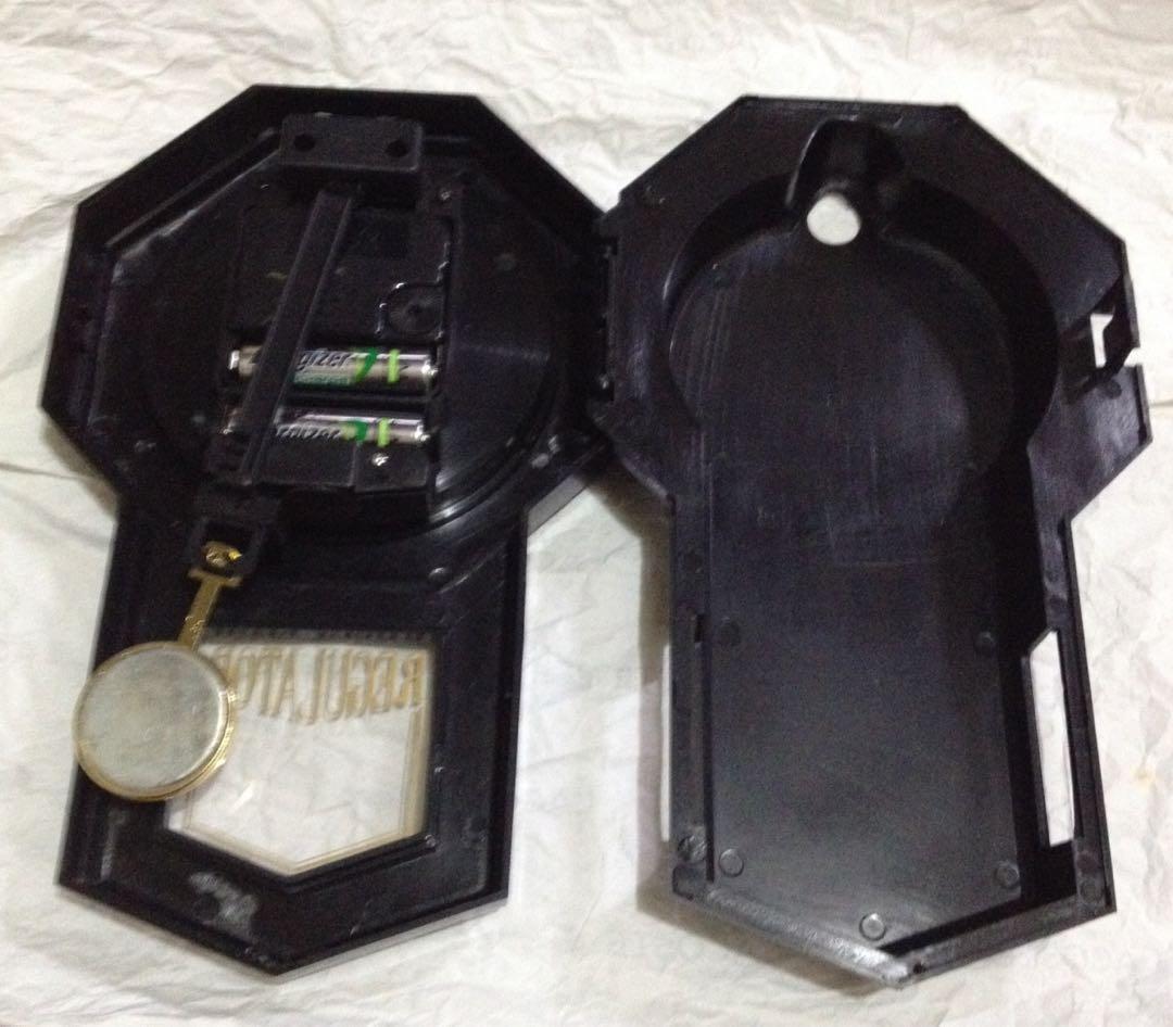Classic Wall Clock With Pendulum (Category: Clocks) located in Makati City. Submitted by citromon_potpourri (Listing ID 188376395, Image 2). Description: Body made of thermoplastic, has a gold bezel, white face, black hands and numbers. Sweep mode second hand and pendulum movement. No Chime..