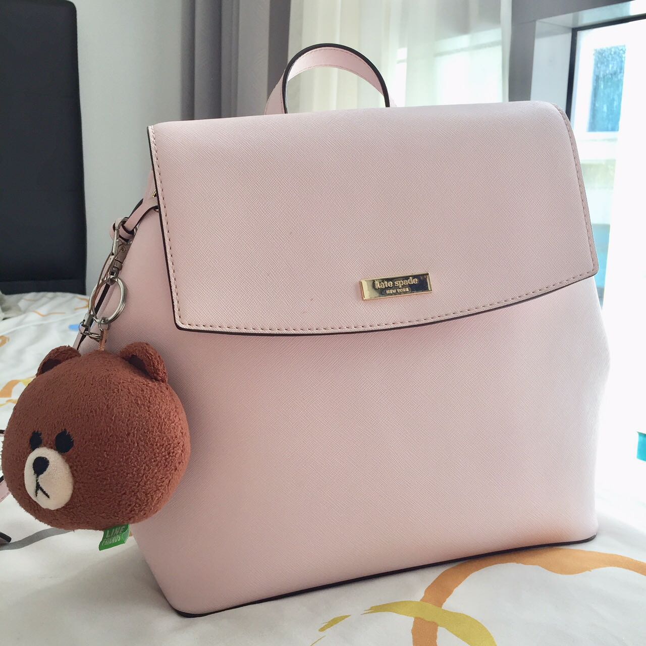 light pink kate spade backpack