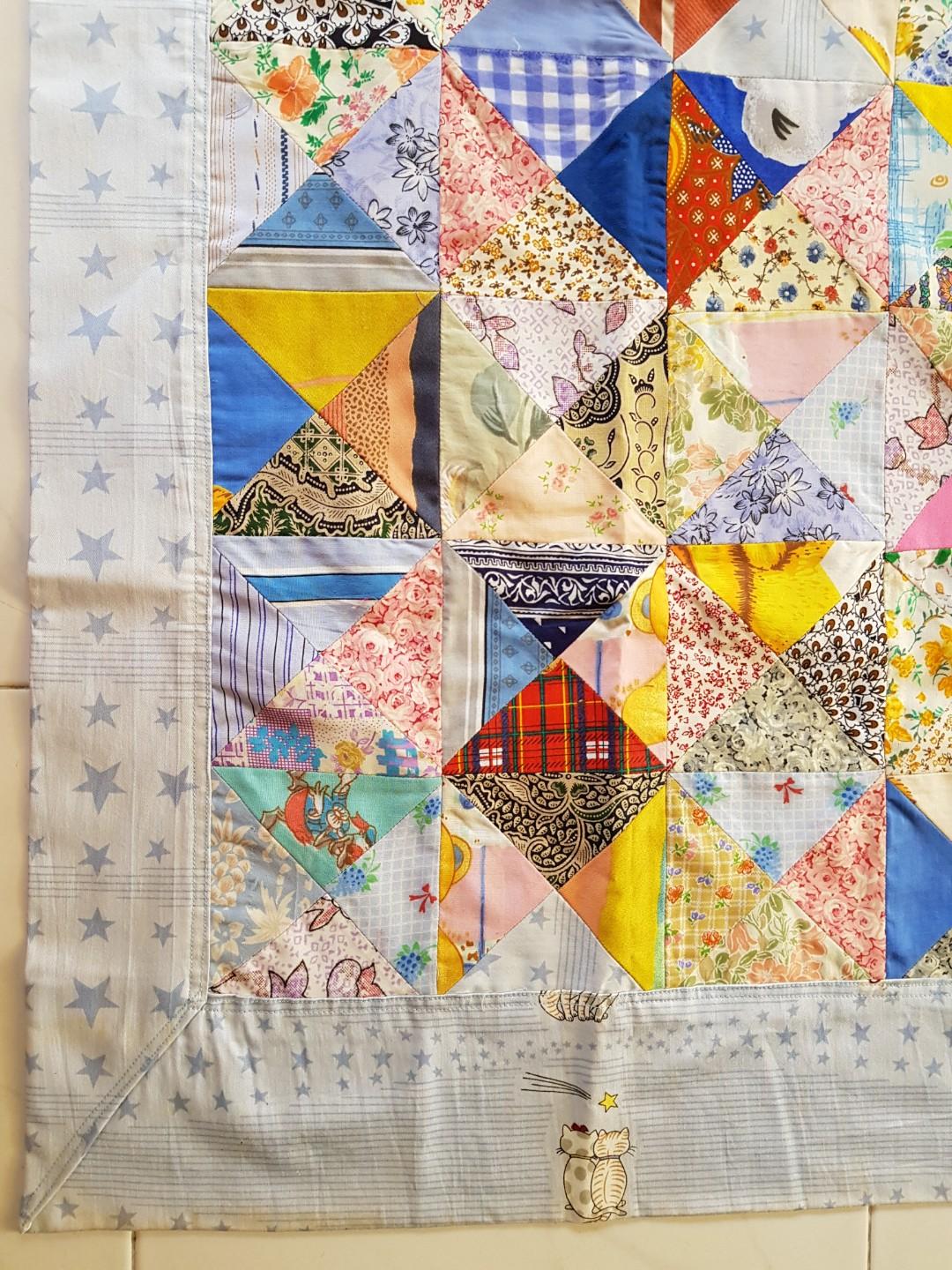 Patchwork Blanket (Category: Changing Mats & Accessories) located in Singapore. Submitted by cokelite (Listing ID 190251404, Image 2). Description: Dimension: 100cm by 95cm. Due to storage, some parts have turned yellow. See photo 5..