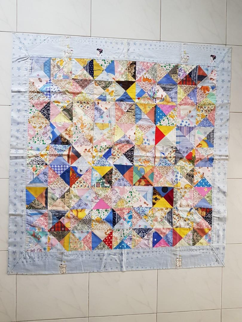 Patchwork Blanket (Category: Changing Mats & Accessories) located in Singapore. Submitted by cokelite (Listing ID 190251404, Image 1). Description: Dimension: 100cm by 95cm. Due to storage, some parts have turned yellow. See photo 5..