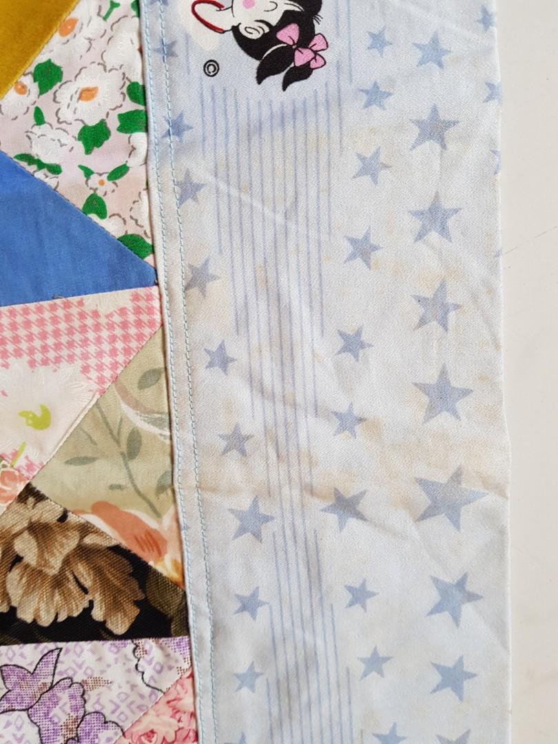Patchwork Blanket (Category: Changing Mats & Accessories) located in Singapore. Submitted by cokelite (Listing ID 190251404, Image 5). Description: Dimension: 100cm by 95cm. Due to storage, some parts have turned yellow. See photo 5..