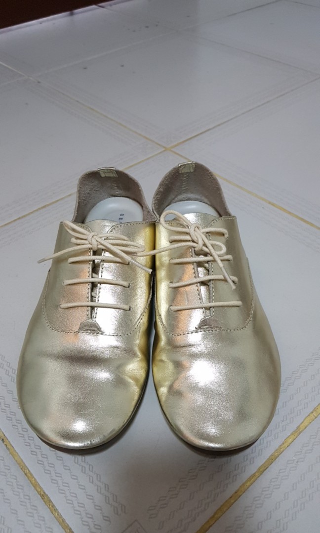 gold sole shoes