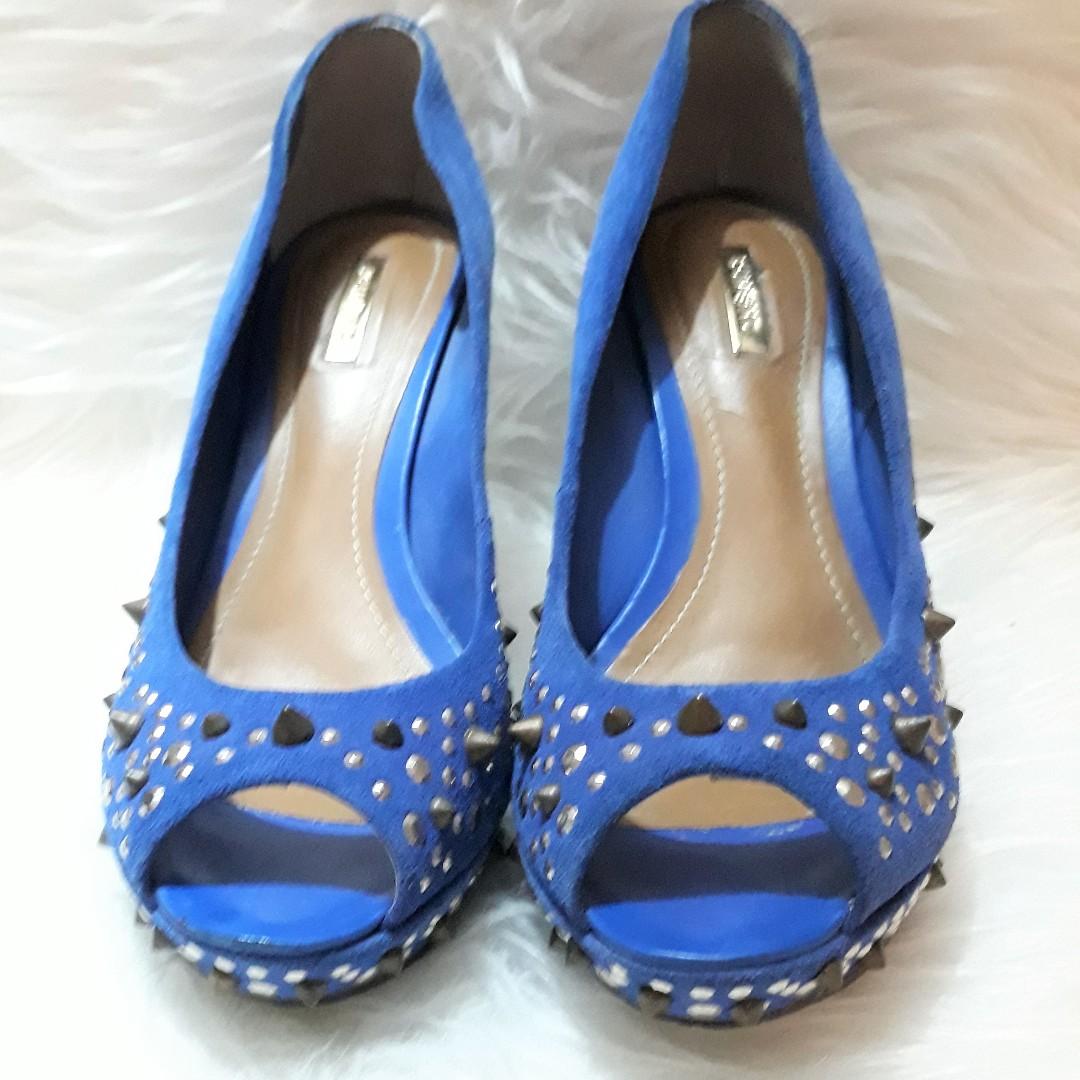 blue studded shoes