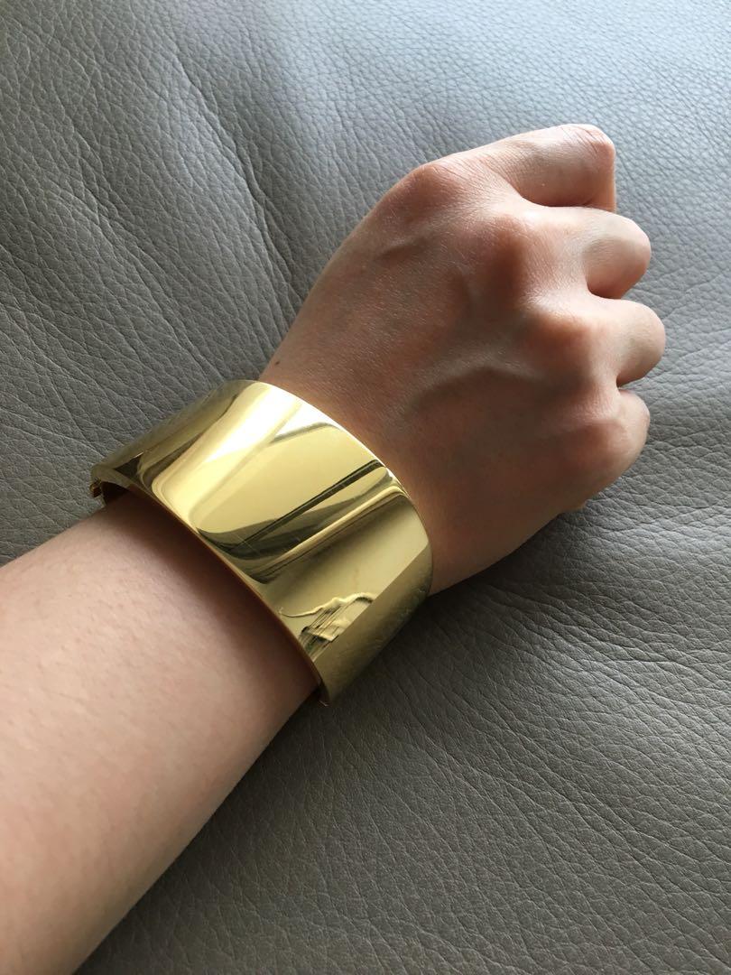 Calvin Klein gold cuff - small size, Women's Fashion, Jewelry & Organisers,  Precious Stones on Carousell
