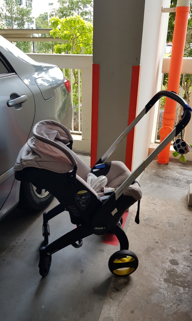 Doona infant car seat stroller dune beige Babies Kids Going
