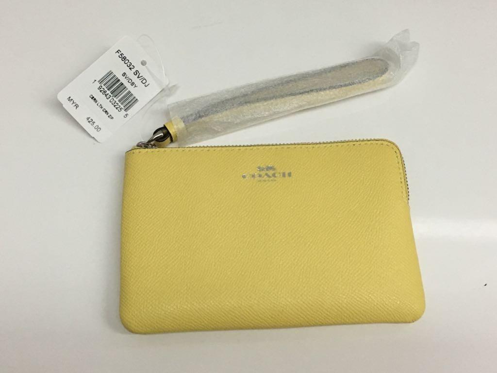 Coach wristlet yellow deals
