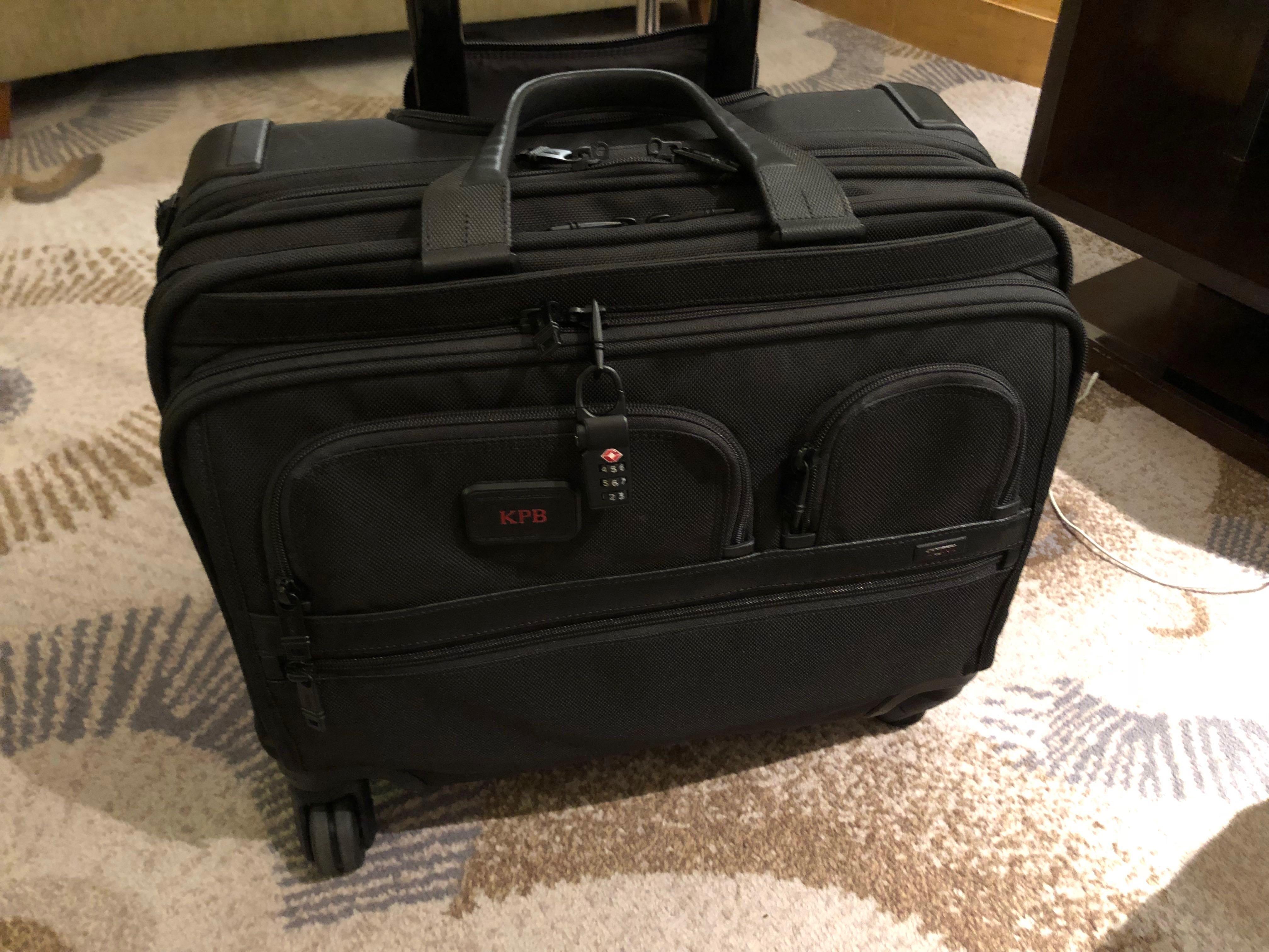 Rolling briefcase tumi top
