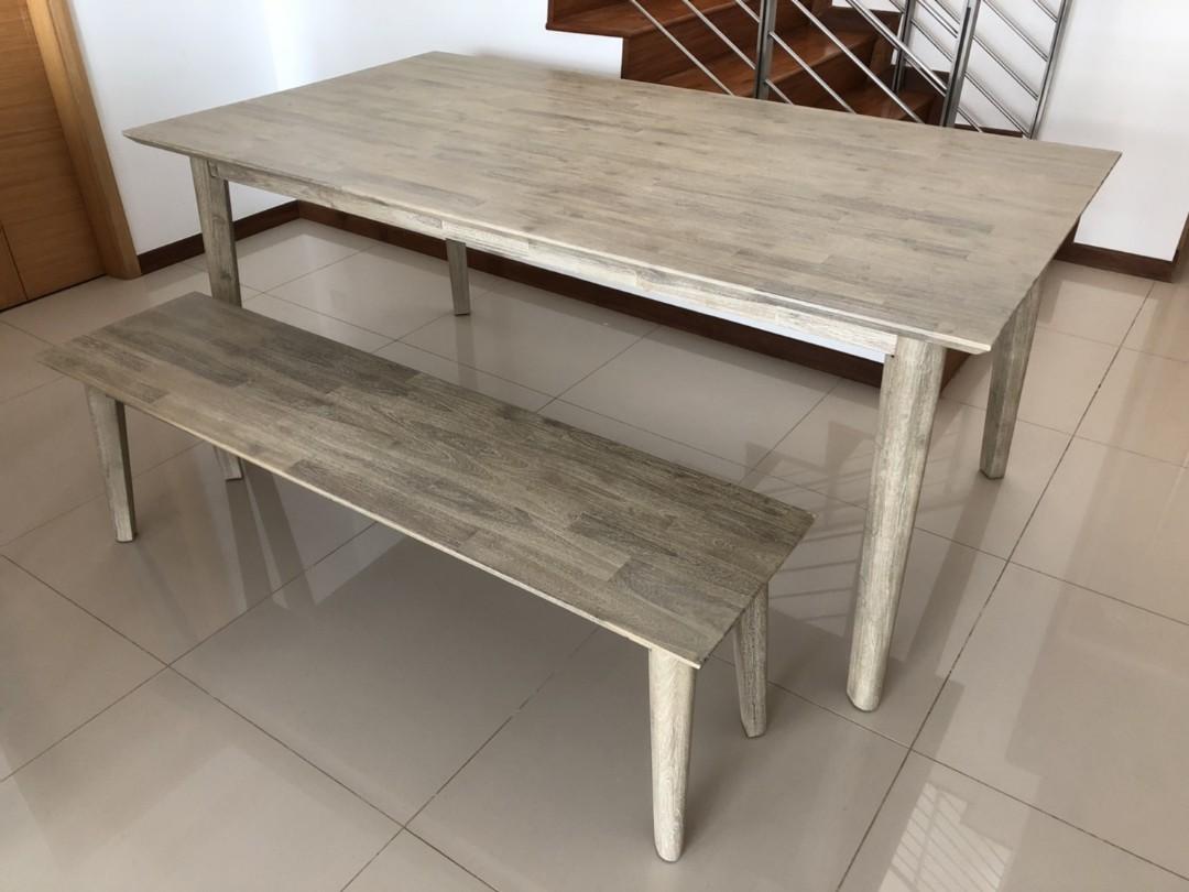 Dining table set (Category: Tables & Sets) located in Singapore. Submitted by pebbles3 (Listing ID 191037583, Image 1). Description: Moving out sale!! Real wood dining table set with bench. Great condition Dining table 100 x 180 cm Bench 146 x 37 cm Pick up available from 06.10.2018.