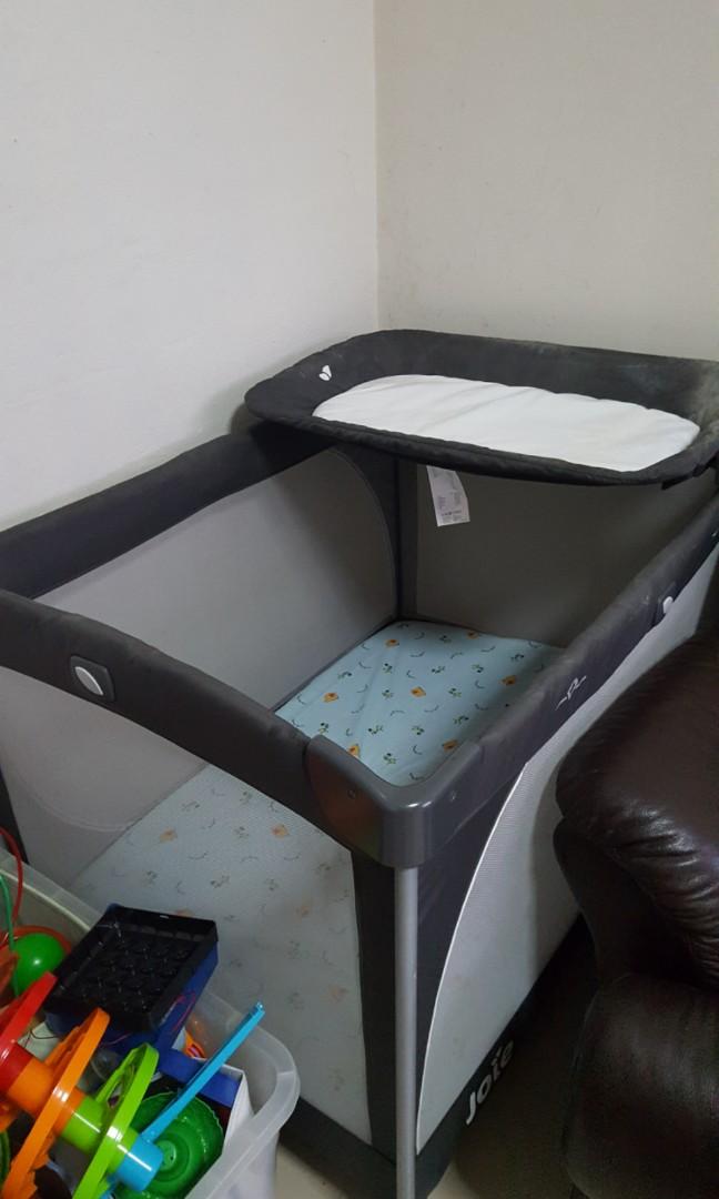 baby cot with nappy changer