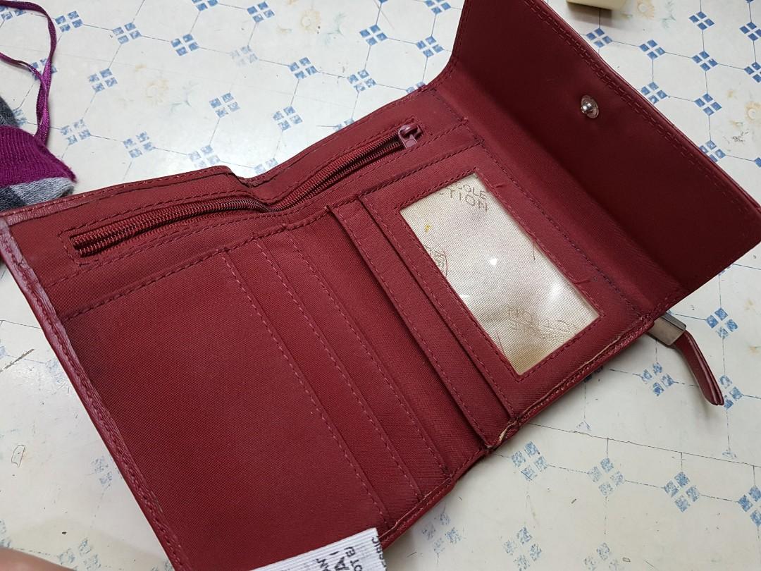 Kenneth Cole Reaction Red Leather Wallet (Category: Luxury Bags & Wallets) located in Pasig City. Submitted by clothesandthings_ (Listing ID 191011067, Image 2). Description: Genuine leather See photos for discoloration in coin pocket No defects Authentic Kenneth Cole Reaction Brand Original price @4000 #ilovesale.