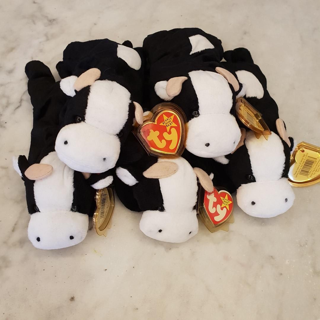 1 Left. GENUINE TY BEANIE BABY Daisy The Cow. Brand new. Mint