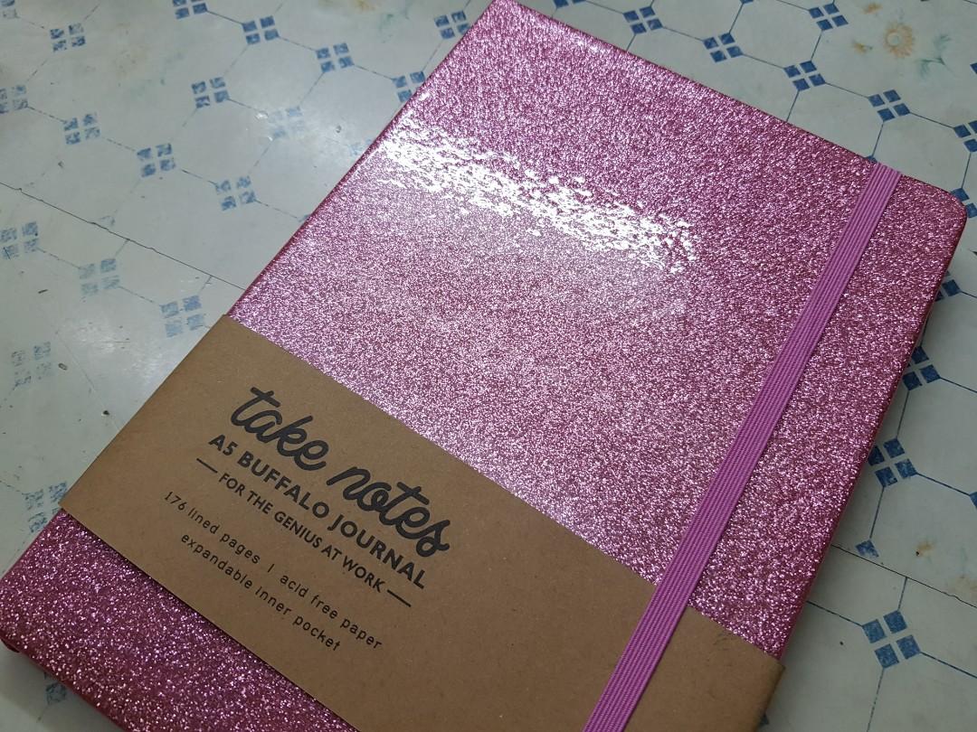Glitter Pink Notebook with Strap (Category: Stationery & School Supplies) located in Pasig City. Submitted by clothesandthings_ (Listing ID 191163974, Image 1). Description: #11sale.
