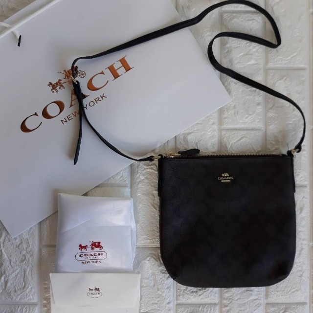 latest coach sling bag