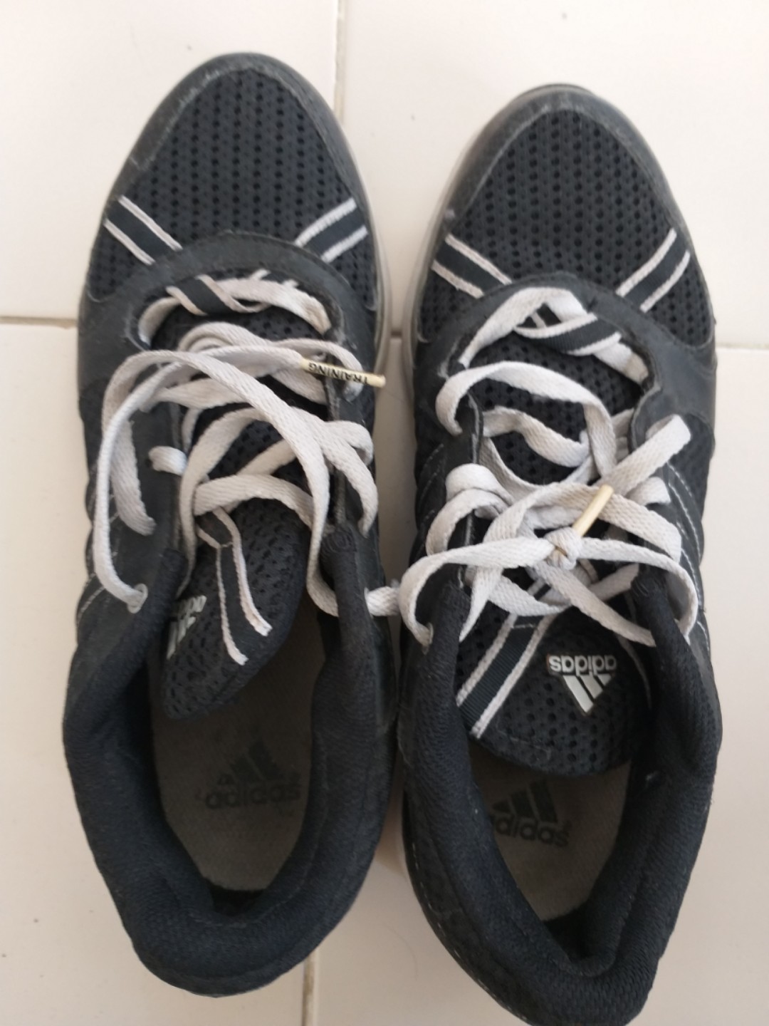 white cross training shoes