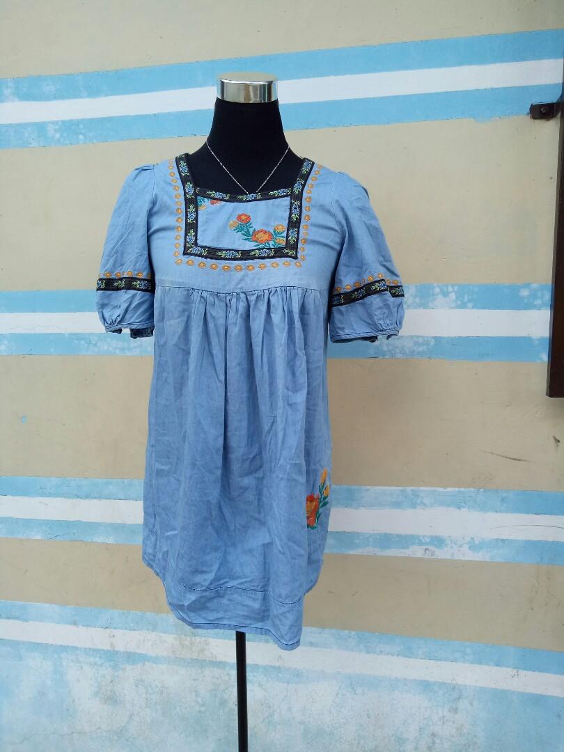Embroidered Dress (Category: Dresses) located in Marikina City. Submitted by threefty (Listing ID 191428413, Image 2). Description: Soft denim dress with embroidered details Above knee. No flaws Fits XS to Small Very cute when worn.