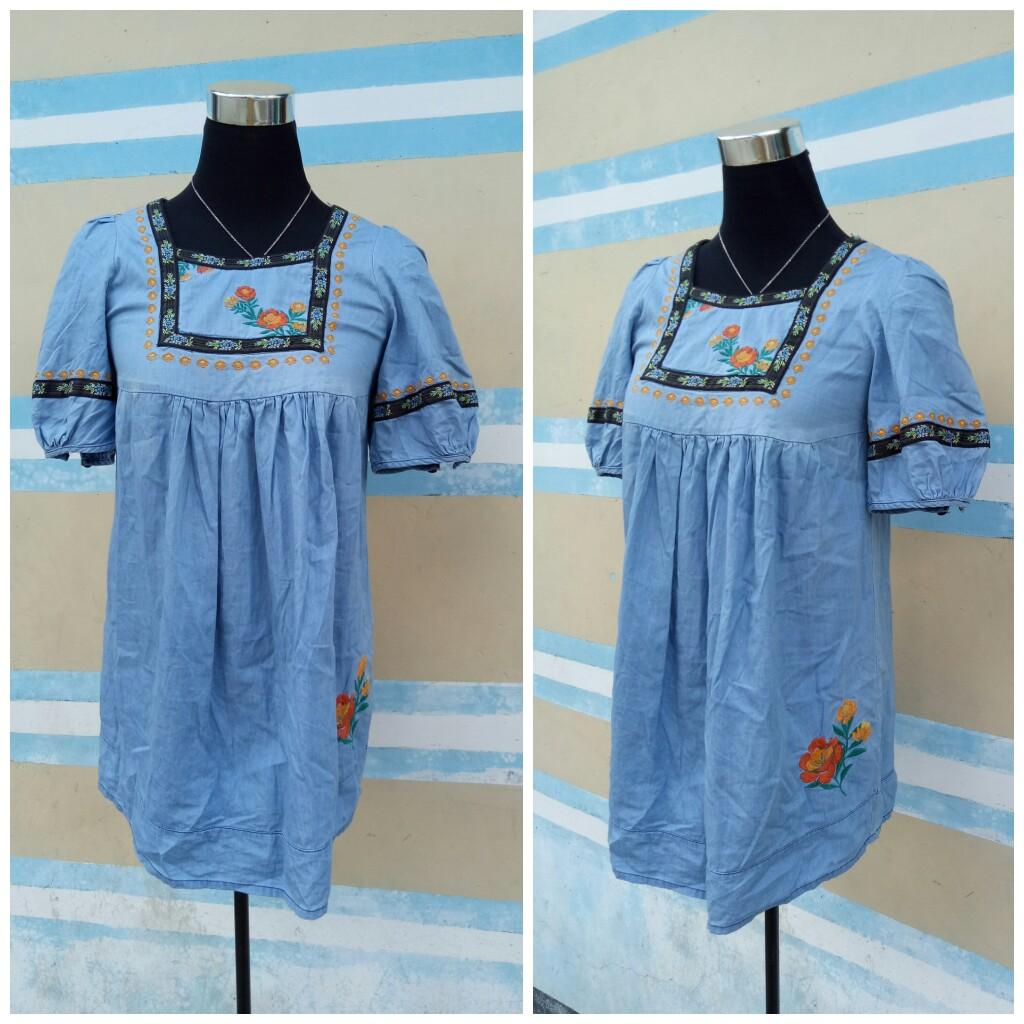 Embroidered Dress (Category: Dresses) located in Marikina City. Submitted by threefty (Listing ID 191428413, Image 1). Description: Soft denim dress with embroidered details Above knee. No flaws Fits XS to Small Very cute when worn.