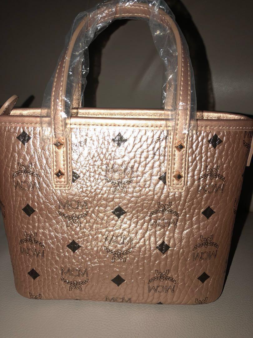 Champagne best sale mcm bag