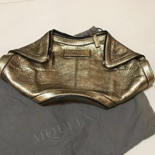 Alexander mcqueen deals gold clutch
